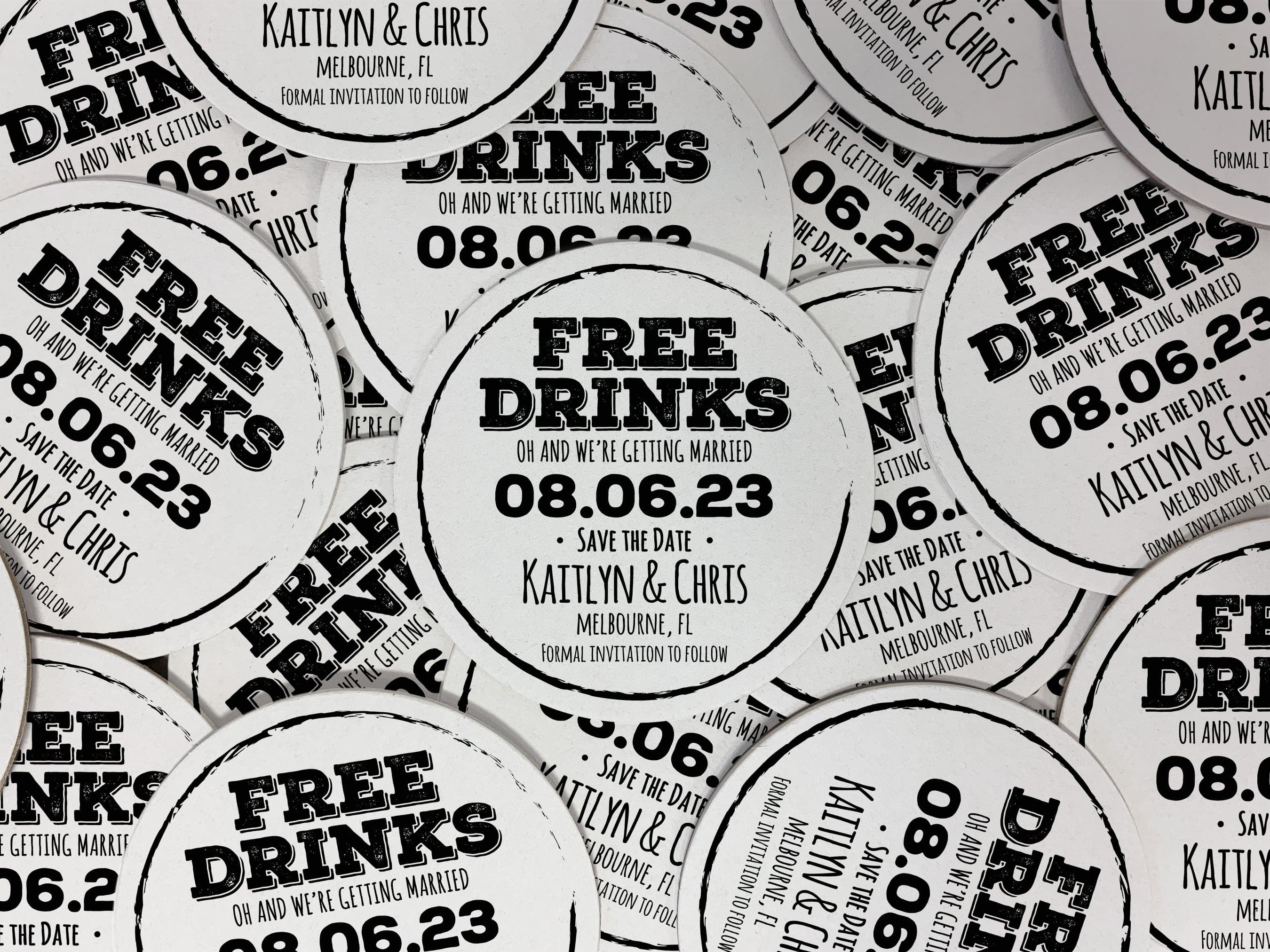 Single coaster is shown on top of a stack of coasters on white background. Coasters feature Free Drinks Save the Date design. Design has a circular brushstroke around the text “Free Drinks, Oh And We’re Getting Married, 08.06.23, Save The Date, Kaitlyn & Chris, Melbourne, FL, Formal Invitation to Follow”. Design is printed in black on a white round coaster.