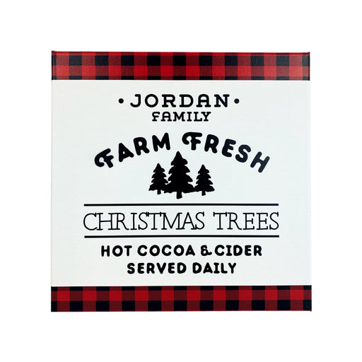 Canvas design with white background shown. Farm Fresh Christmas Trees design shown on canvas. Design has red and black plaid border with black text, Jordan Family Farm Fresh Christmas Trees Hot Cocoa & Cider Served Daily.