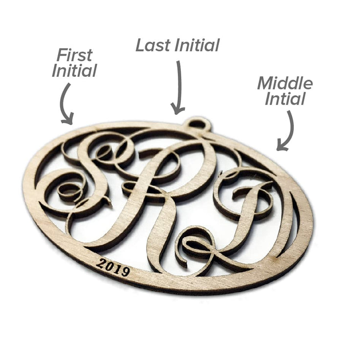 Ornament shown with monogram letter placement. Letter placement: First name initial, last name initial, middle name initial. Elegant Monogram ornament design is featured. The letters SRD can be seen as a monogram with the year laser etched onto ornament. Ornament is made of birch wood and laser cut.