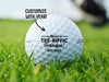 Single white titleist golf ball with Tee-riffic Grandpa design on a grassy golf course. The text "customize with year" is above the ball with an arrow pointing toward it.