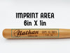 wooden mini baseball bat with custom laser engraved design that features a baby name design with a date and info text and says "Nathan, Future All-Star, Sept. 13, 2021, 7 LBS. 3oz" on a white surface with the text Imprint Area 6inx1in
