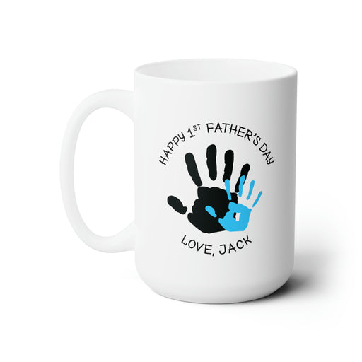 white ceramic mug that says happy first fathers day love Jack with a blue handprint design 