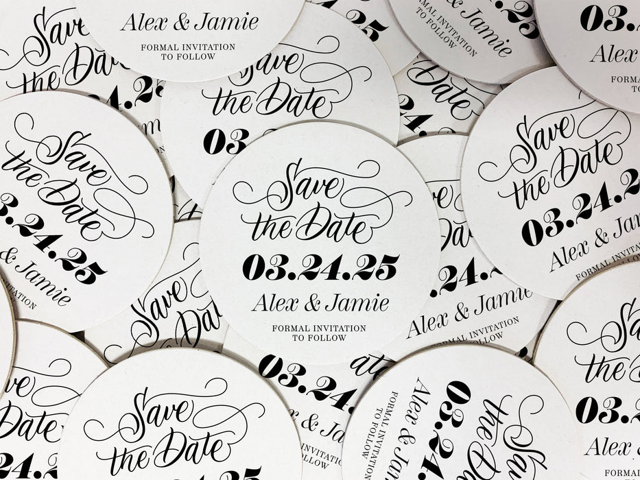 Multiple coasters spread in all different directions. Coasters say Save the Date, wedding date, married couple names, and formal invitation to follow.