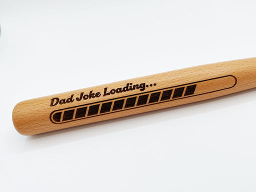 Photo of laser engraved Dad Joke Loading mini bat design.