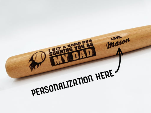 Photo of laser engraved Fathers Day Home Run mini bat design. Personalization is available for custom name.