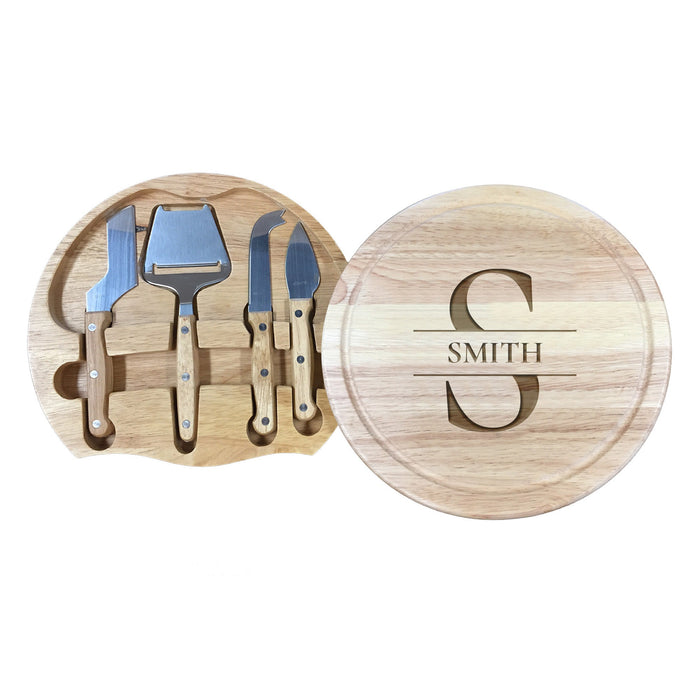 wooden cheeseboard with stainless steel cheese knives toolset with last name and initial engraving of the name Smith and the letter S