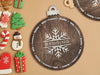 dark brown ornament cookie tray with snowflake design that says Rensing and Milk and cookies for Santa, ontop of brown background surrounded by various types of holiday cookies