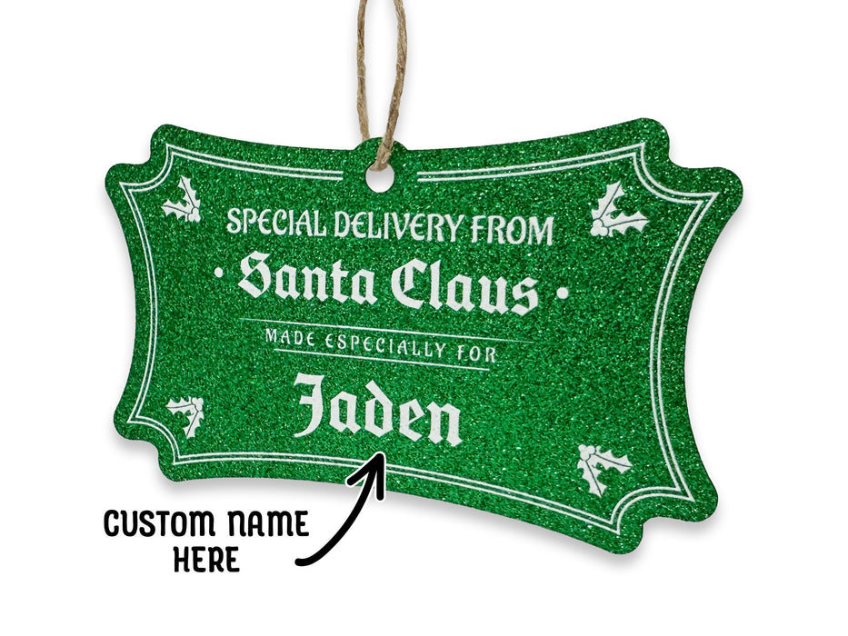 A green glitter cardstock hanging Santa gift tag is shown on a white surface. The text below it reads, Custom Name Here.