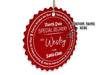 A hanging red glitter cardstock Santa gift tag is shown on a white surface. The text above it reads, Custom Name Here.