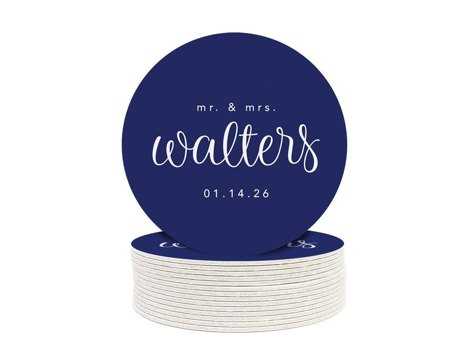A stack of round coasters with the words mr and mrs Walters on them against a white background. Coasters feature a custom last name design with a married couple's last name and wedding date.