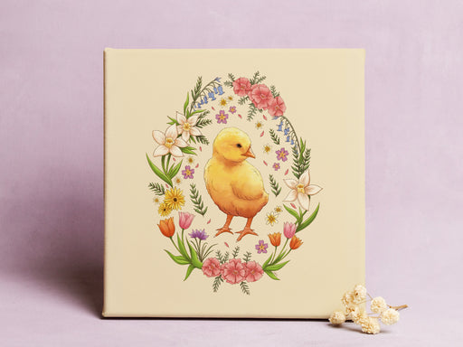 12x12 inch canvas with spring easter chick pastel easter art in front of a purple wall with small flowers in front of the canvas
