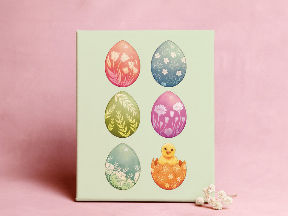 8x10 canvas with colorful easter artwork of rows of eggs and a baby chick in front of a pink wall with small white flowers in front of the canvas