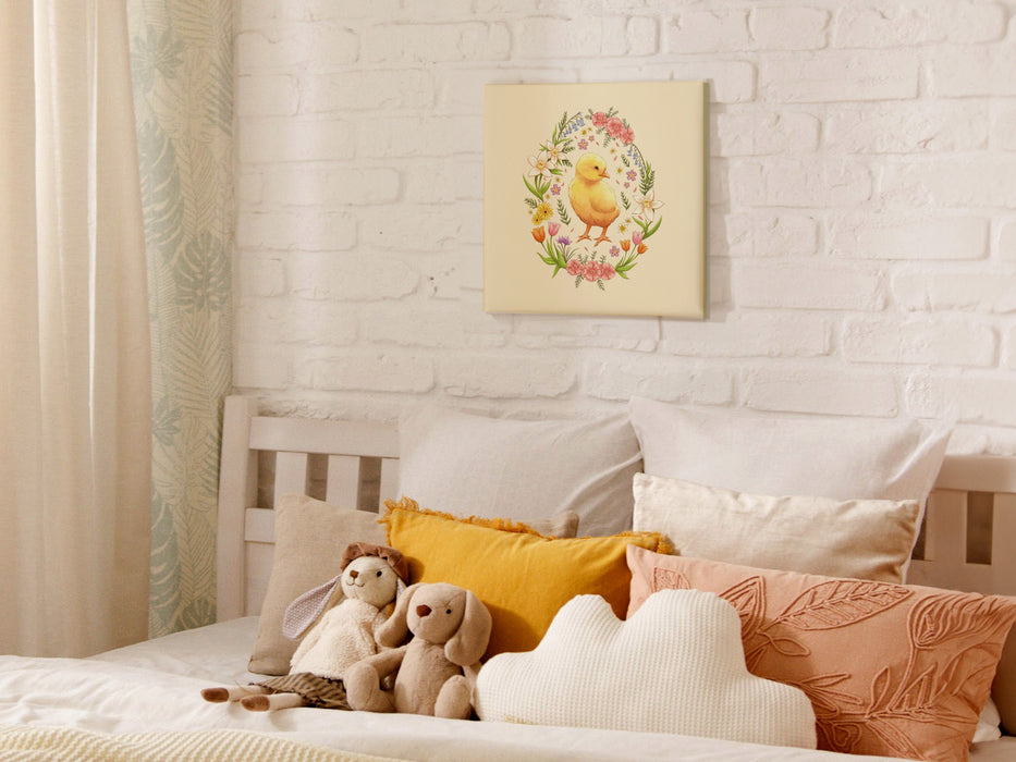 12x12 inch canvas with spring easter chick pastel easter art on white brick wall hanging over bed in bedroom decorated with cute pillows and rabbit stuffed animals