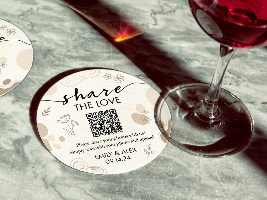 marble table with a custom wedding photo gallery QR code coaster under a wine glass
coaster says share the love, please share your photos with us simply scan with your phone and upload
Emily and Alex with the date